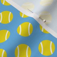 Yellow tennis ball design on blue background