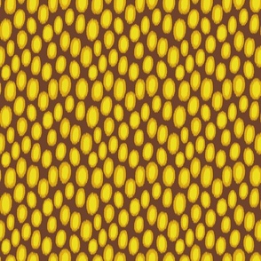 abstract leopard spots in ikat style | yellow on brown | small