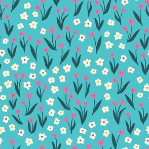 Pink and white flowers on teal