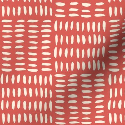 Modern abstract geometric painted pattern of dashes in squares on background paint color of the year Raspberry Blush, ivory white dotted stripes, salmon pink