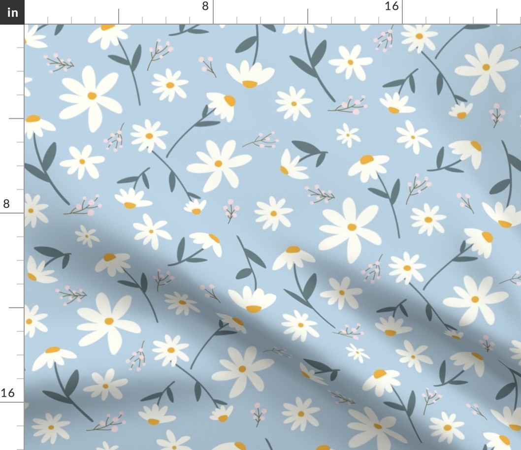 Daisies on light blue/multidirectional/non directional/small /floral 