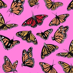 hand painted monarch butterflies in orange on a pink background 