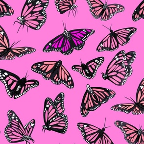 hand painted monarch butterflies in pink on a pink background 