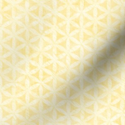 Celandine Flowers in Buttercup Yellow | A 'Flower of Life' tessellating, geometric pattern, rustic Moroccan tile circles and triangles in pale yellow and cream. 
