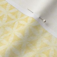 Celandine Flowers in Buttercup Yellow | A 'Flower of Life' tessellating, geometric pattern, rustic Moroccan tile circles and triangles in pale yellow and cream. 