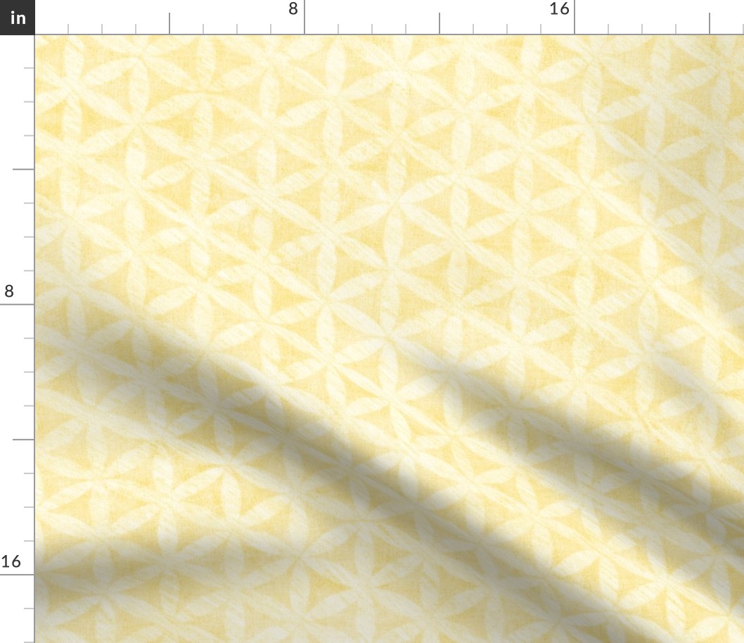 Celandine Flowers in Buttercup Yellow (xl scale) | A 'Flower of Life' tessellating, geometric pattern, rustic Moroccan tile circles and triangles in pale yellow and cream.