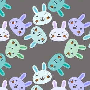 Cute bunny faces in blue