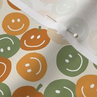Cute Happy Halloween Pumpkins in Oranges and green on off white