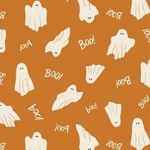 Halloween boo ghosts on pumpkin orange