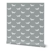 Tangram fox in white on grey