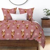Jumbo – vintage cat wrapped as a Christmas present on grid with snow – dusty pink
