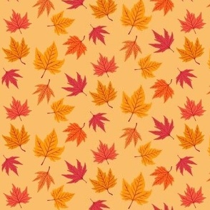 Red and Orange Maple Leaves on Golden Yellow