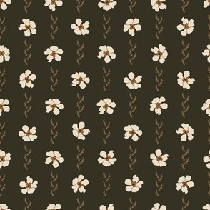 white daisies polka dots on dark green with grass twigs
