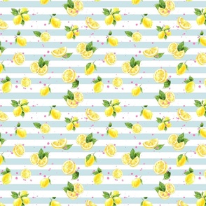 Lemons on a blue and white stripe background with pink paint spatters
