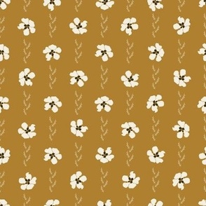 light daisies polka dot on bright honey brown with grass