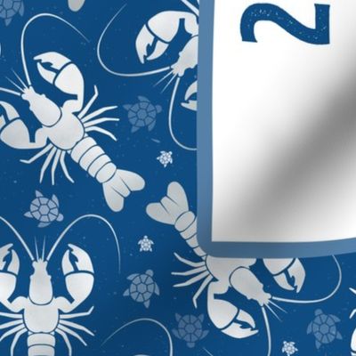 2024 Calendar Tea Towel – silver lobster on dark blue