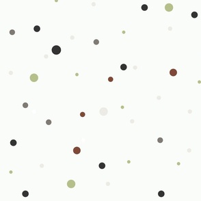Multi coloured polka dots tossed confetti on white 