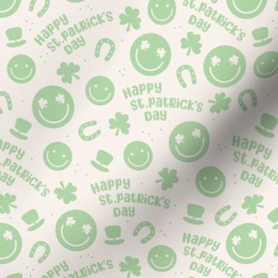 Happy St. Patrick's Day tossed icons - smileys lucky shamrock and leprechaun hat mint green on ivory sand 