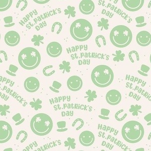 Happy St. Patrick's Day tossed icons - smileys lucky shamrock and leprechaun hat mint green on ivory sand 