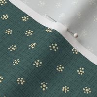 cream colored dotted tiny flowers on textured moody medium-dark muted blue-green - medium scale