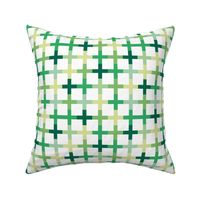 Modern St. Patrick's Day tartan grid design - geometric crosses checker design Irish plaid 5 shades of green 