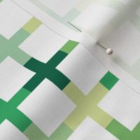 Modern St. Patrick's Day tartan grid design - geometric crosses checker design Irish plaid 5 shades of green 