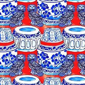 Staffordshire dogs and blue and white chinoiserie jars on red background