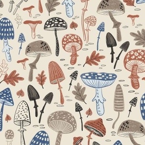 Cozy Fall Mushrooms Pattern: featuring red, grey and blue mushrooms on cream, medium scale