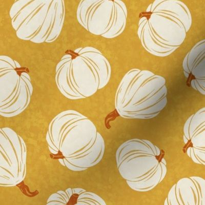Tossed pumpkins in gold/yellow background- fall collection 
