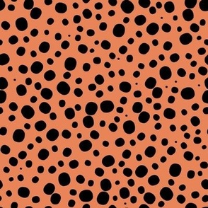 Black halloween dots/spots on orange 