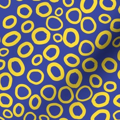 Lethbridge - lounge carpet (dark blue with yellow rings)