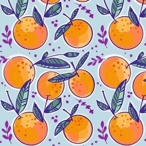 Hand drawn oranges on pale blue with leafy sprigs and texture dots large scale pattern
