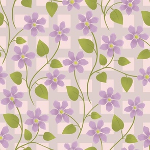 Traditional Provence style lavender clematis on a checkered trellis