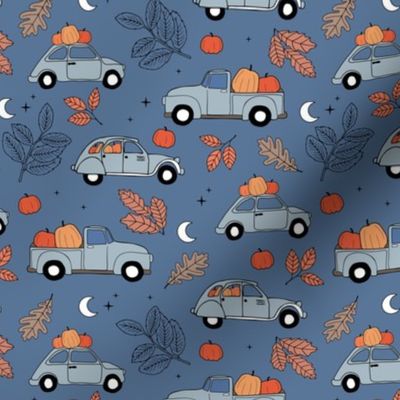 Driving home for fright night cars - halloween pumpkins and autumn leaves traffic moon and stars orange blue