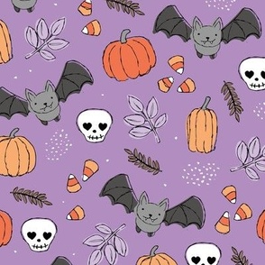 Sweet boho style halloween bats pumpkins and leaves halloween candy garden orange coral lilac on purple violet