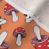 MUSHROOM Fabric Pattern, Red and White Mushrooms on Orange Background