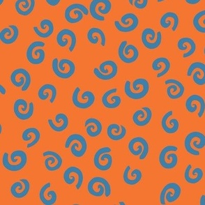 Lethbridge - purple-haired girl’s top (orange with blue spirals)