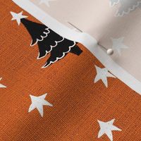 Rustic cabin core faux burlap hessian with silhouette trees and stars half drop 6” repeat orange faux  burlap, black Christmas trees and white stars 