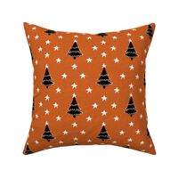 Rustic cabin core faux burlap hessian with silhouette trees and stars half drop 6” repeat orange faux  burlap, black Christmas trees and white stars 