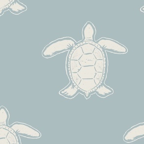 Large hand drawn turtles in muted blue and cream