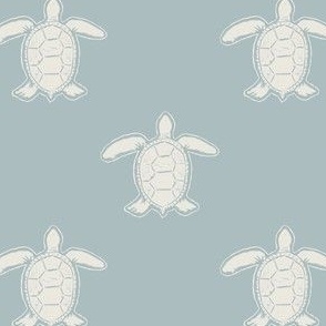 Medium hand drawn turtles in muted blue and cream