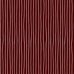 Thin white vertical repeat stripes on Maroon small scale 4 x 4 