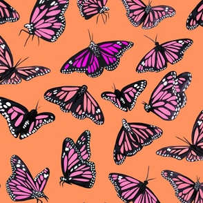 hand painted monarch butterflies in pink on a orange background 