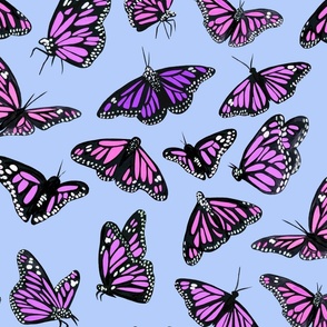 hand painted monarch butterflies in purpley pinks on a blue background 