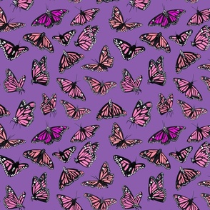 hand painted monarch butterflies in pink on a purple background - smaller scale