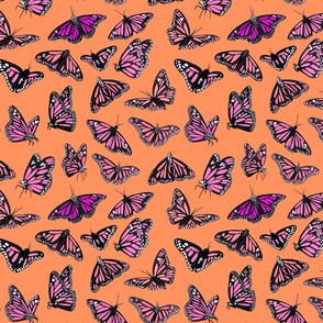 hand painted monarch butterflies in pink on a orange background - smaller scale