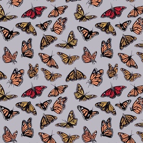 hand painted monarch butterflies in orange on a light grey background - smaller scale