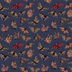 hand painted monarch butterflies in orange on a grey background - smaller scale