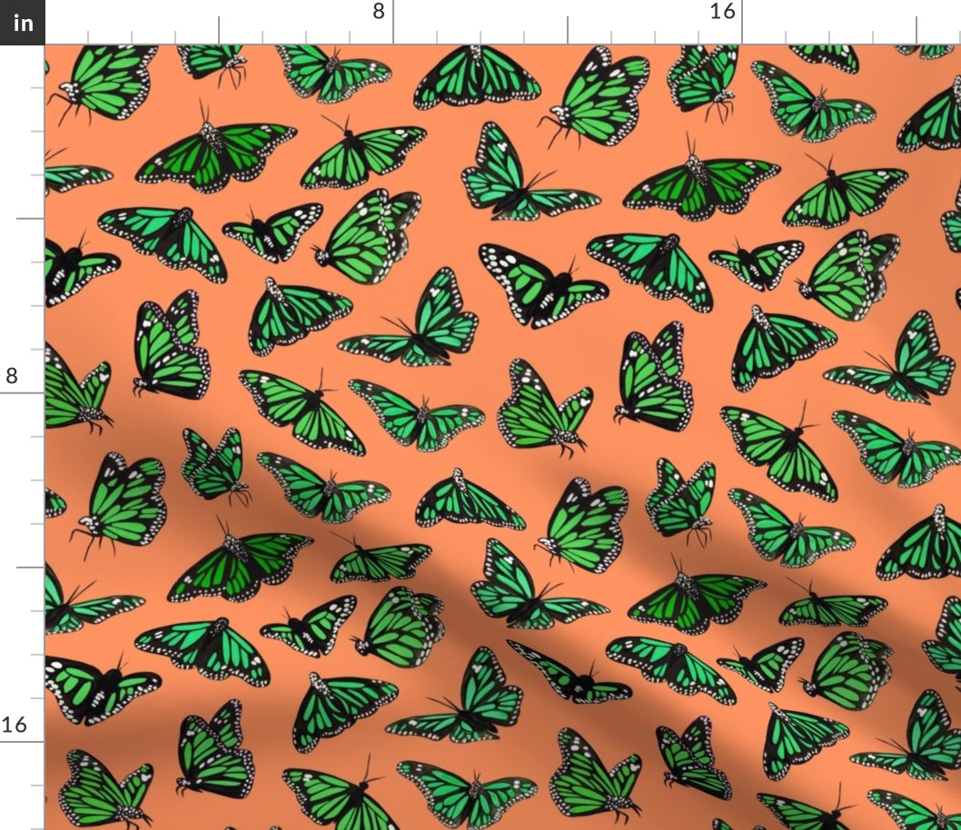 hand painted monarch butterflies in green on a orange background - smaller scale
