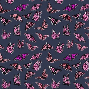 hand painted monarch butterflies in pink on a grey background - smaller scale